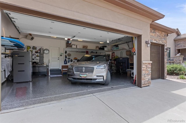 8070 W Progress Cir, Littleton, CO 80123 - garage featuring concrete driveway