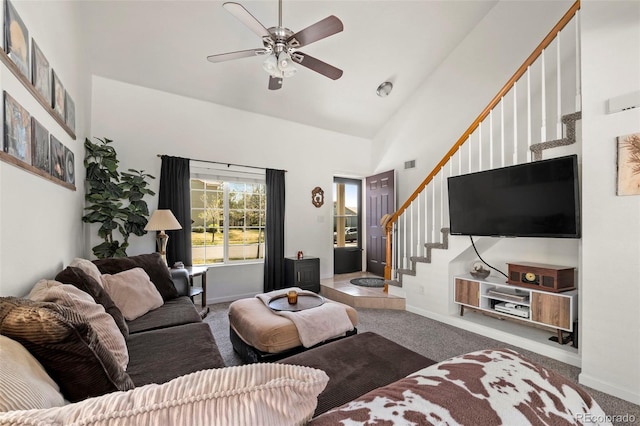 4713 Perth St, Denver, CO 80249 - carpeted living room with stairs, high vaulted ceiling, ceiling fan, and baseboards