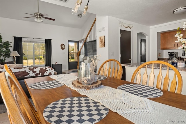4713 Perth St, Denver, CO 80249 - dining space with ceiling fan and arched walkways