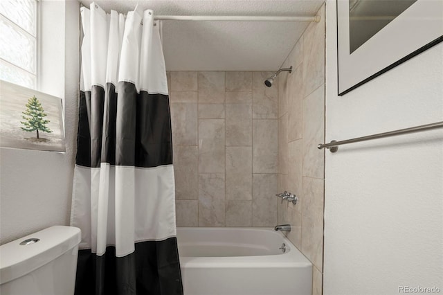 4713 Perth St, Denver, CO 80249 - full bathroom featuring toilet, shower / bath combination with curtain, and a textured ceiling