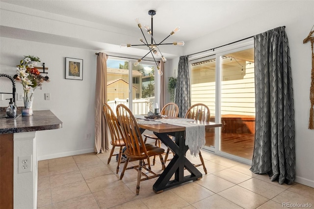 4713 Perth St, Denver, CO 80249 - dining area with a chandelier, light tile patterned floors, and baseboards