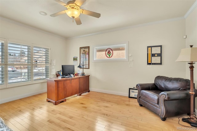 office with crown molding, ceiling fan, and light hardwood / wood-style floors