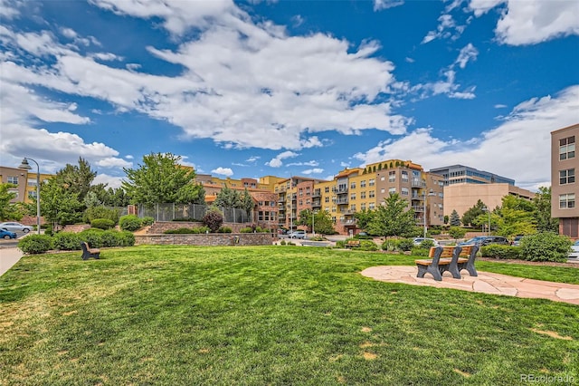 view of community featuring a yard