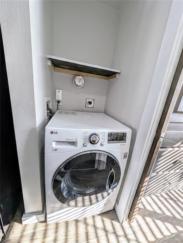 laundry room with washer / clothes dryer