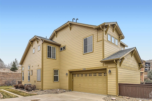 exterior space with a garage