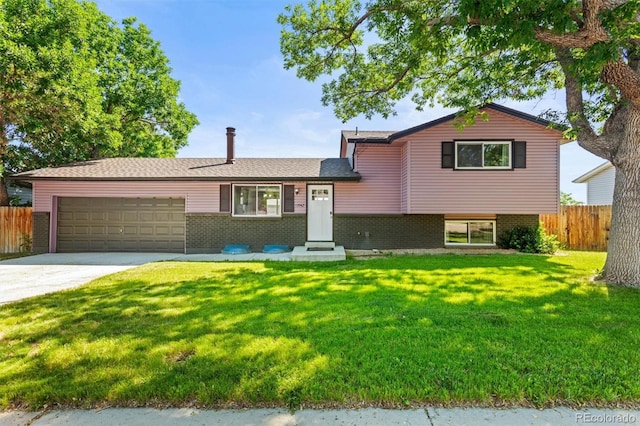 13542 Achilles Dr, Lone Tree, CO 80124 - tri-level home with a garage, concrete driveway, and brick siding