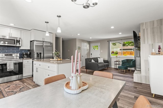 13542 Achilles Dr, Lone Tree, CO 80124 - dining space featuring recessed lighting and dark wood-type flooring