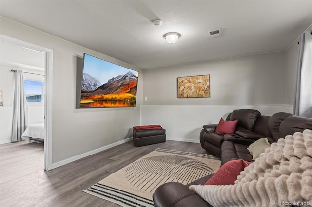 13542 Achilles Dr, Lone Tree, CO 80124 - living room featuring wood finished floors and baseboards
