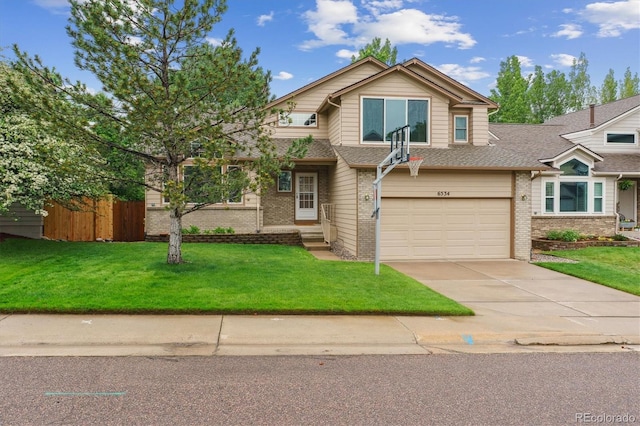 6534 S Union Way, Littleton, CO 80127 - view of front of property with brick siding, driveway, a garage, and a shingled roof