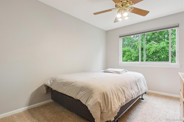 6534 S Union Way, Littleton, CO 80127 - bedroom with carpet flooring, baseboards, and a ceiling fan