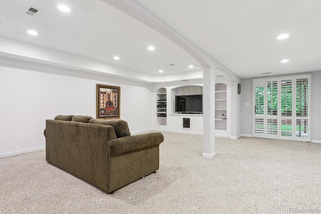6534 S Union Way, Littleton, CO 80127 - living room with carpet flooring, baseboards, recessed lighting, and built in shelves