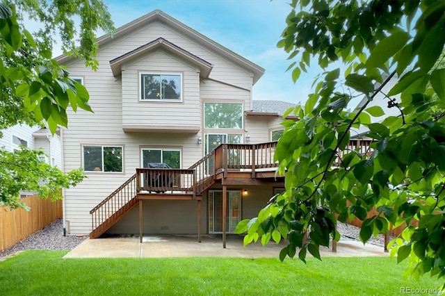 6534 S Union Way, Littleton, CO 80127 - rear view of property with a wooden deck, stairway, and a patio area