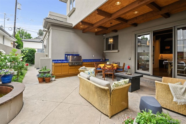 458 Adams St, Denver, CO 80206 - view of patio with area for grilling and a fire pit
