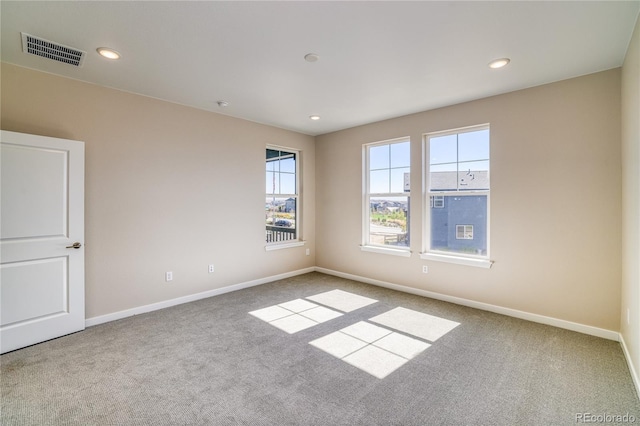 view of carpeted spare room