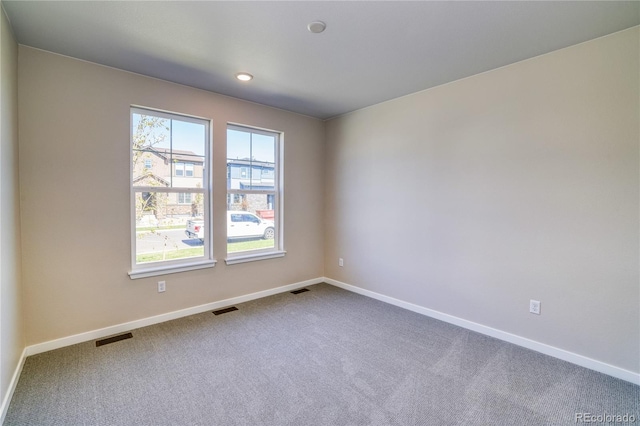 unfurnished room with carpet