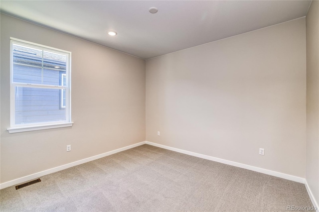 empty room with carpet floors