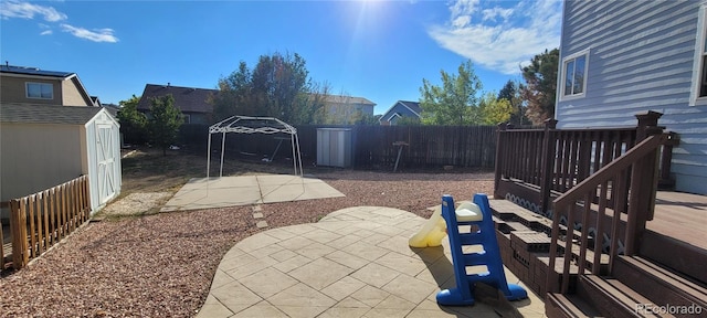 view of patio / terrace with a storage shed