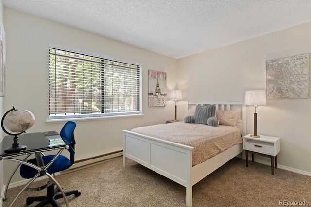 534 E 7th Ave Unit 101, Denver, CO 80203 - carpeted bedroom with multiple windows, a textured ceiling, baseboards, and baseboard heating