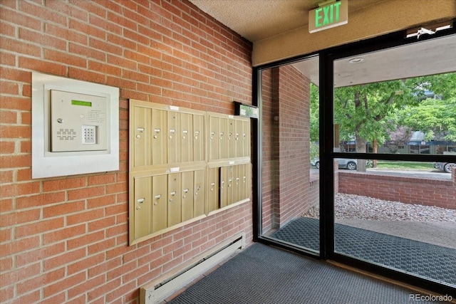 534 E 7th Ave Unit 101, Denver, CO 80203 - doorway with brick wall and mail area