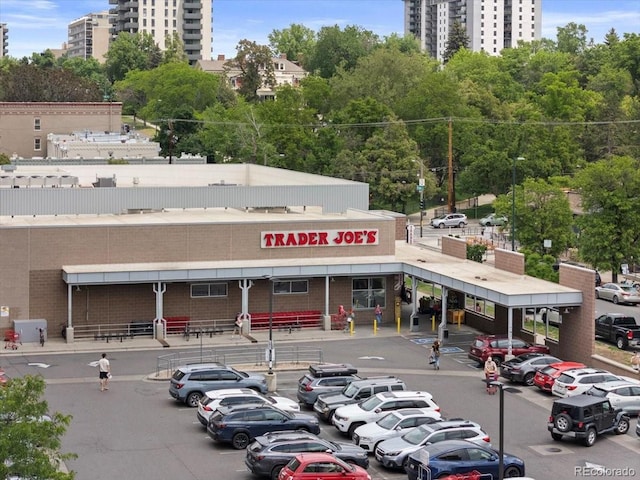 534 E 7th Ave Unit 101, Denver, CO 80203 - view of building exterior with uncovered parking