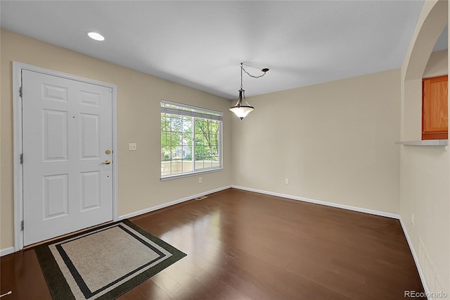 4006 E Geddes Cir, Centennial, CO 80122 - entryway with dark wood finished floors, recessed lighting, and arched walkways