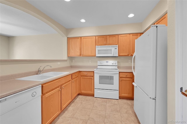 4006 E Geddes Cir, Centennial, CO 80122 - kitchen with white appliances, light tile patterned floors, light countertops, and recessed lighting