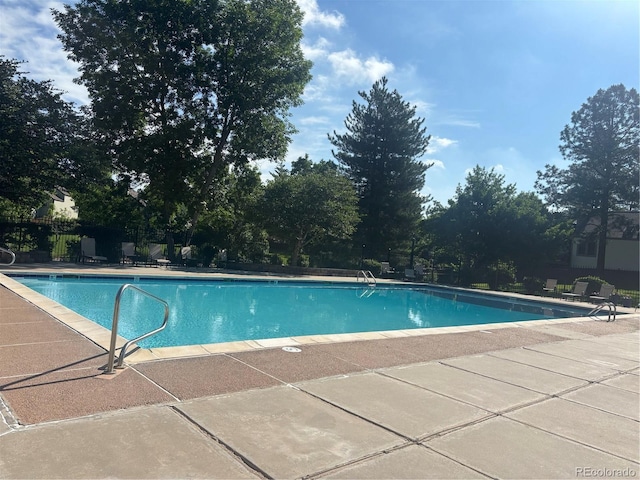 5479 E Weaver Ave, Centennial, CO 80121 - community pool featuring a patio area
