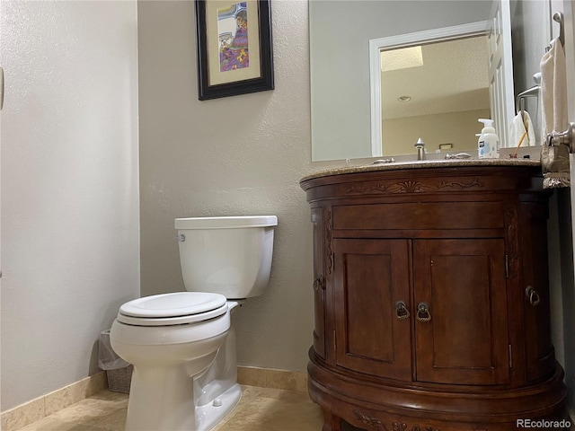 5479 E Weaver Ave, Centennial, CO 80121 - bathroom featuring baseboards and vanity