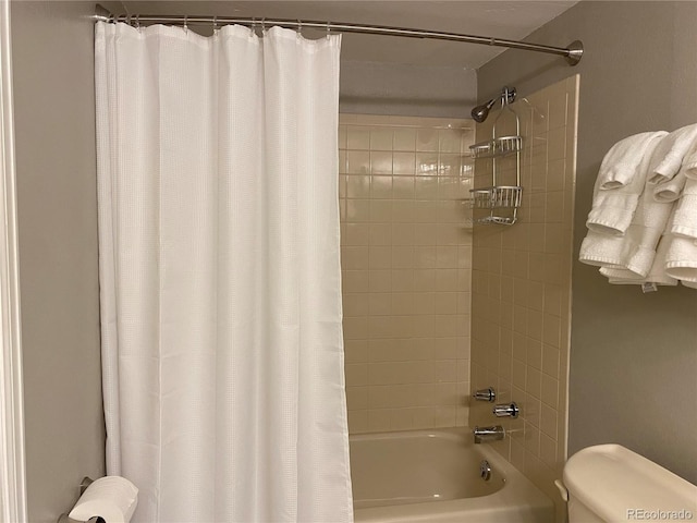 5479 E Weaver Ave, Centennial, CO 80121 - bathroom with shower / tub combo with curtain and toilet
