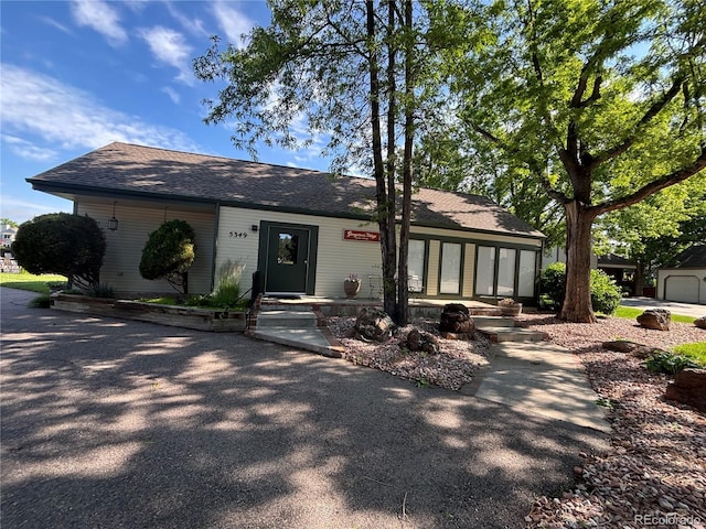 5479 E Weaver Ave, Centennial, CO 80121 - view of front facade with roof with shingles