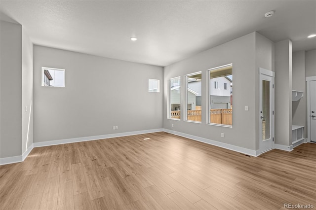 21034 E 63rd Dr, Aurora, CO 80019 - spare room with a smoke detector, light wood-style flooring, and recessed lighting