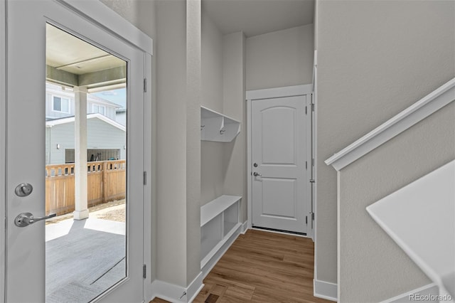 21034 E 63rd Dr, Aurora, CO 80019 - mudroom with wood finished floors and baseboards