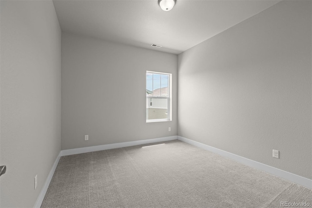 21034 E 63rd Dr, Aurora, CO 80019 - spare room featuring carpet floors and baseboards