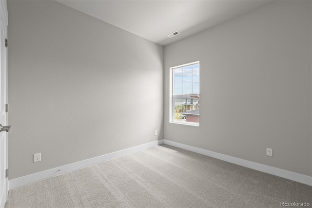 21034 E 63rd Dr, Aurora, CO 80019 - spare room featuring carpet flooring