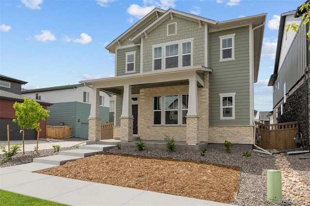 21034 E 63rd Dr, Aurora, CO 80019 - craftsman inspired home featuring covered porch and stone siding