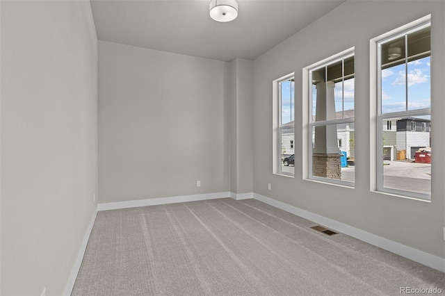 21034 E 63rd Dr, Aurora, CO 80019 - carpeted spare room with baseboards