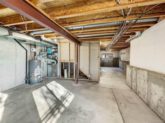 basement featuring gas water heater