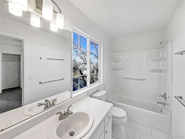 full bathroom featuring tile patterned flooring, vanity, toilet, and shower / bathtub combination