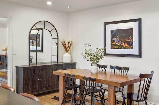 dining room featuring light hardwood / wood-style flooring