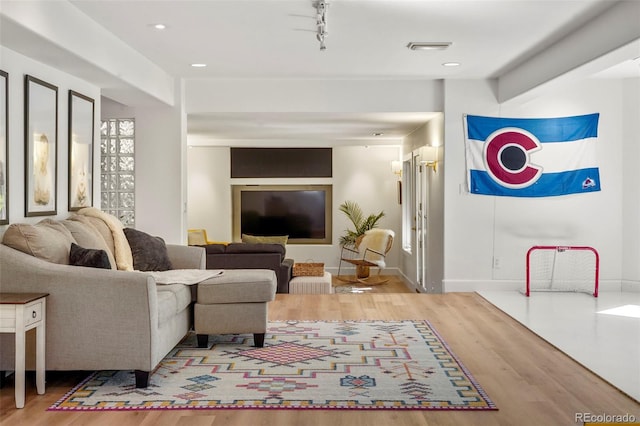 living room with hardwood / wood-style floors