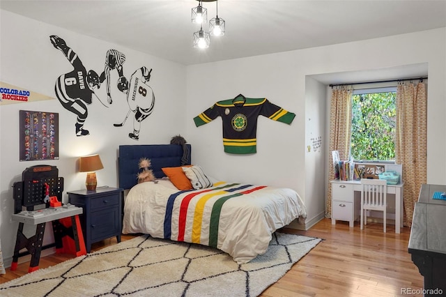 bedroom with light wood-type flooring