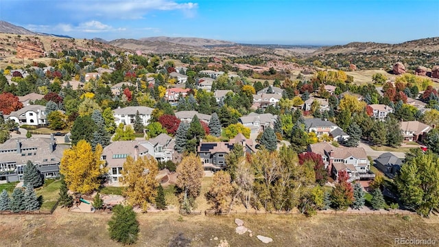 drone / aerial view featuring a mountain view