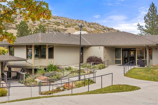 exterior space featuring a mountain view