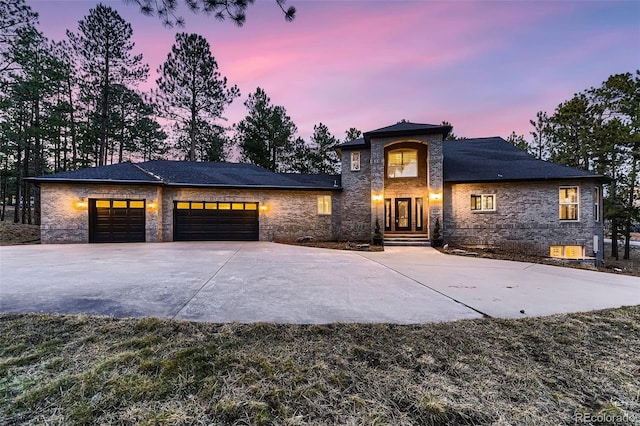 view of front of property with a garage