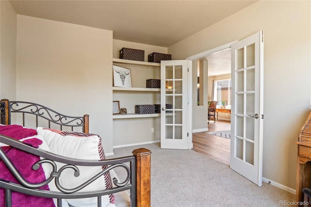 2192 Paint Pony Cir, Castle Rock, CO 80108 - bedroom with french doors and carpet flooring