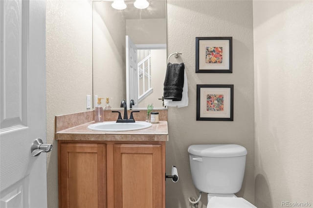 2192 Paint Pony Cir, Castle Rock, CO 80108 - bathroom with vanity and a textured wall