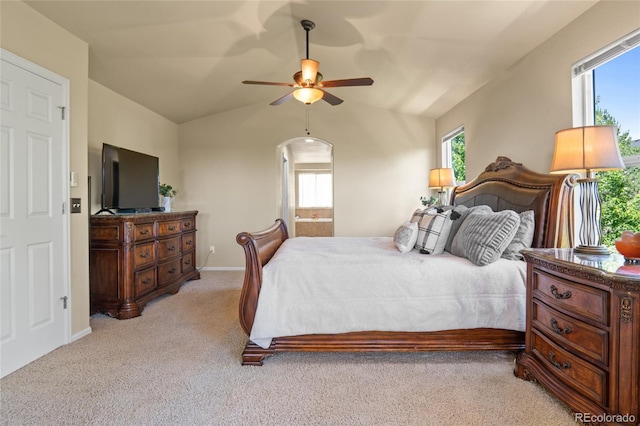 2192 Paint Pony Cir, Castle Rock, CO 80108 - bedroom featuring light carpet, vaulted ceiling, a ceiling fan, and ensuite bathroom