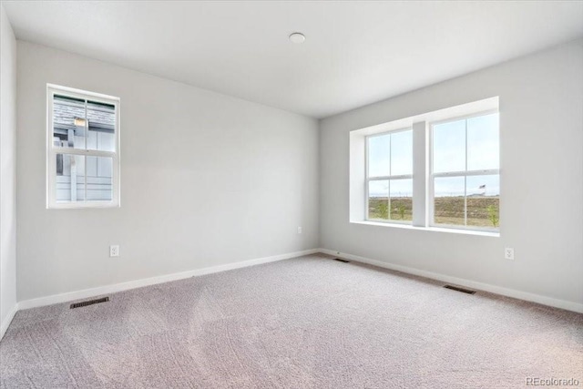 19018 E 94th Pl, Commerce City, CO 80022 - empty room featuring carpet and baseboards