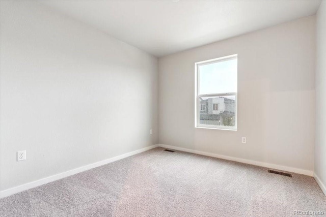 19018 E 94th Pl, Commerce City, CO 80022 - carpeted spare room featuring baseboards