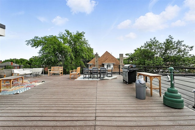 1045 N Clarkson St Unit 102, Denver, CO 80218 - wooden deck with area for grilling, an outdoor living space, and outdoor dining space